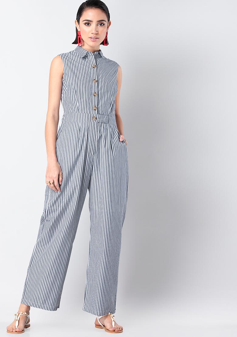 white and navy striped jumpsuit
