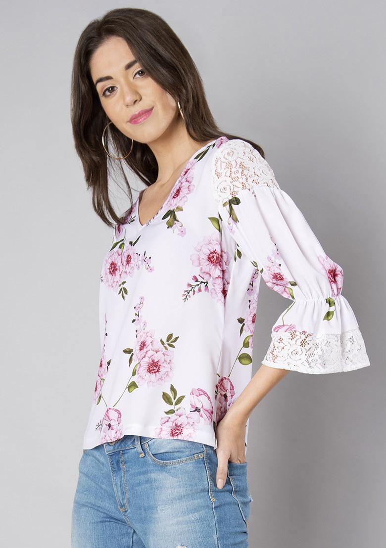 white shirt with flowy sleeves