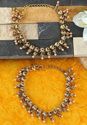 Set Of 2 Gold Plated Beige And Peach Colour Kundan Studded Beaded Vilandi Anklets