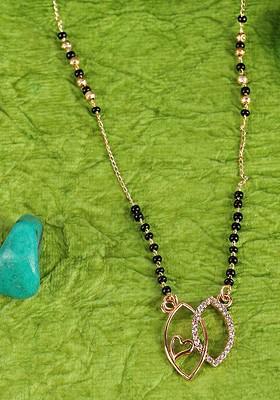 Designer Gold Plated And Black Beaded Traditional Stone Studded Mangalsutra