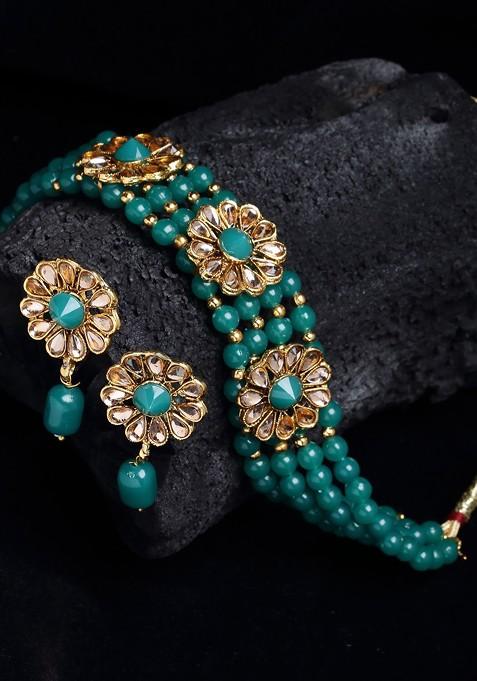 Gold Plated And Green Stone Studded And Beaded Handcrafted Jewellery Set