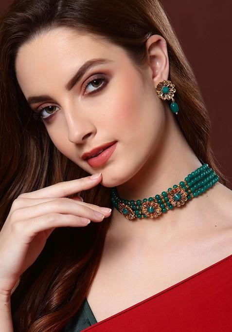 Gold Plated And Green Stone Studded And Beaded Handcrafted Jewellery Set