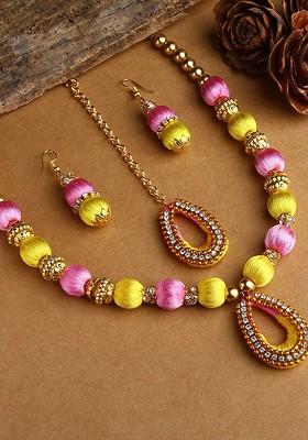 Gold Plated Yellow And Rose Pink Stones Studded And Beaded Wooden Balls Silk Thread Jewellery Set