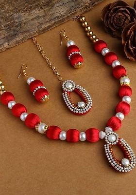 Gold Plated White And Red Stone Studded And Beaded Wooden Balls Silk Thread Jewellery Set