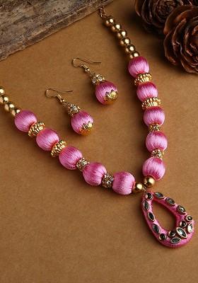 Gold Plated White And Rose Pink Stone Studded And Beaded Wooden Balls Silk Thread Jewellery Set