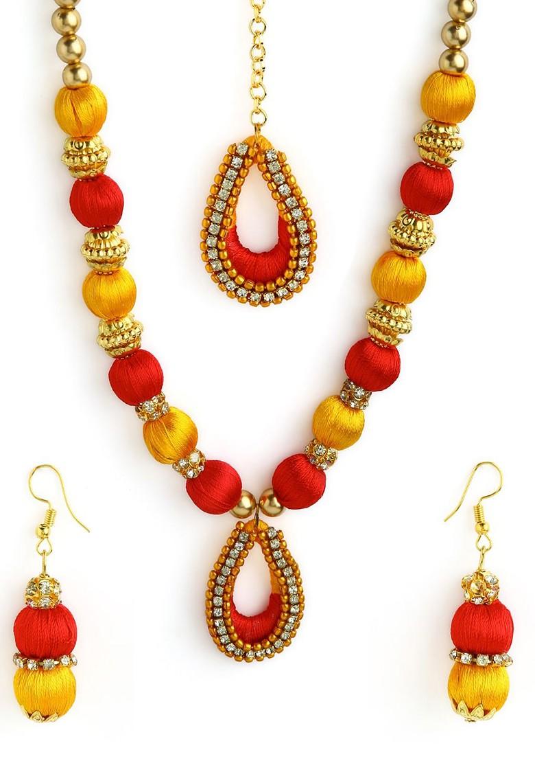 Gold Plated White And Yellow Stone Studded And Beaded Thread Jewellery Set