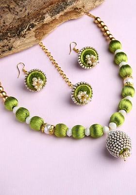 Gold Plated White And Green Stones Studded And Beaded Wooden Balls Silk Thread Jewellery Set