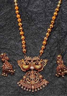 Gold Plated And White Pearl Beaded Peacock Shape Temple Jewellery Set