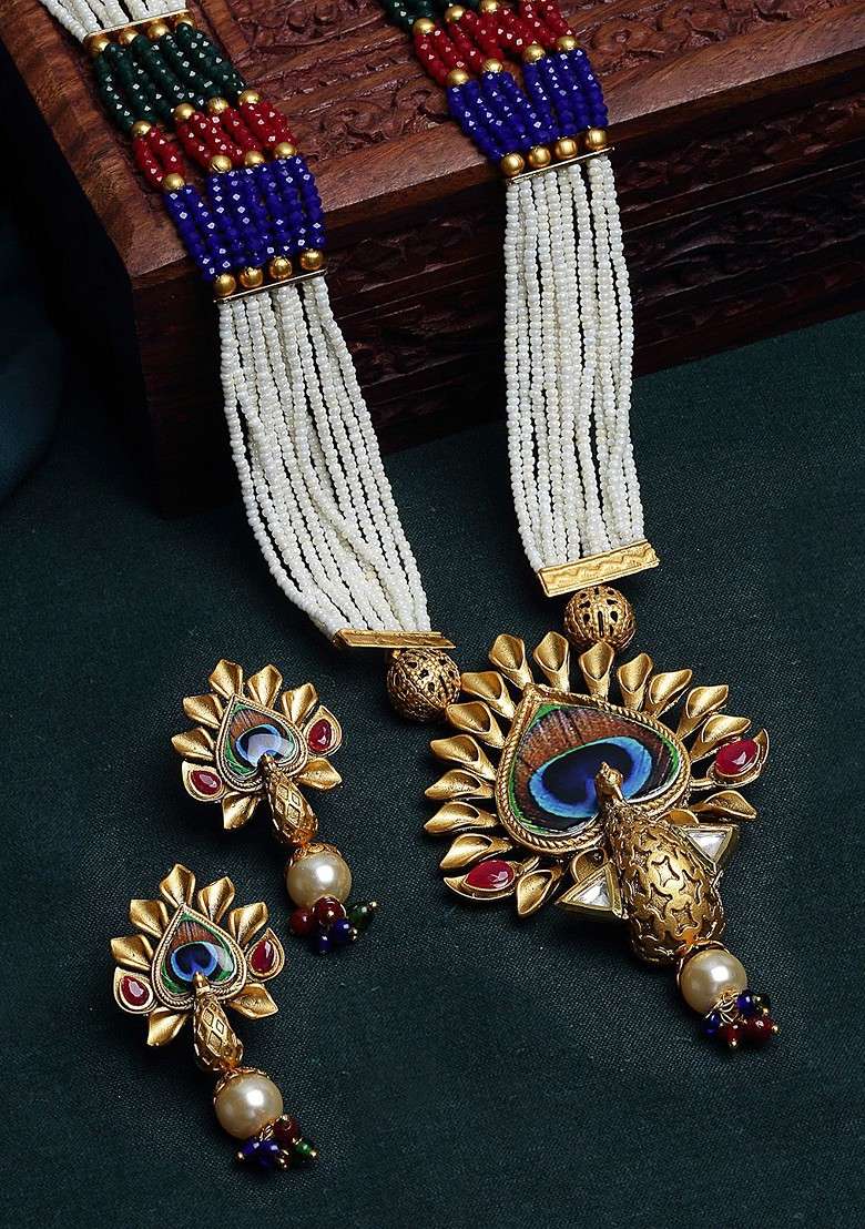 Gold Plated White And Red Stone Studded And Pearl Beaded Jewellery Set - Indya