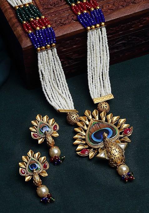 Gold Plated White And Red Stone Studded And Pearl Beaded Jewellery Set