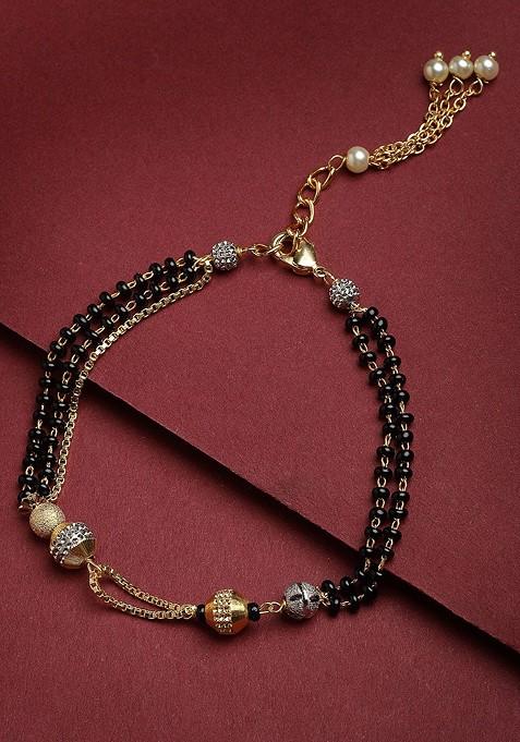 Gold Plated Black Beaded White AD Stone Studded And Beaded Hand Mangalsutra