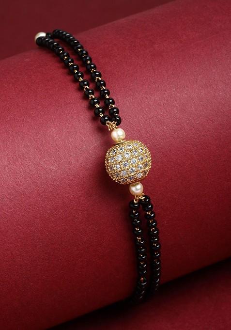 Gold Plated Black Artificial Stones And Beads Studded Hand Mangalsutra