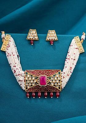 Gold Plated White And Red Kundan Studded And Beaded Jewellery Set