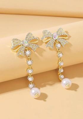 Gold Toned Crystal And Pearl Studded Bow Knot Shaped Dangle Earrings