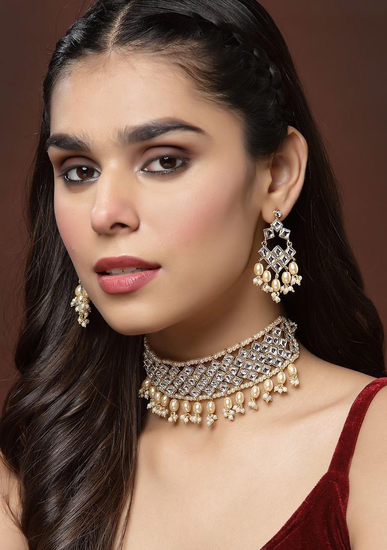 Gold Plated And Maroon Kundan Studded Reversible Jewellery Set