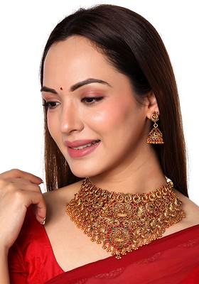 Gold Plated And Pink Artificial Stones Studded And Beaded Temple Jewellery Set