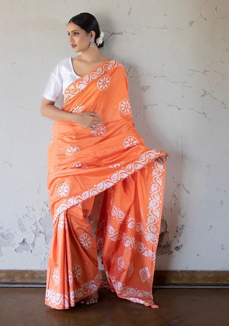Buy Women Orange And White Ethnic Motifs Printed Saree