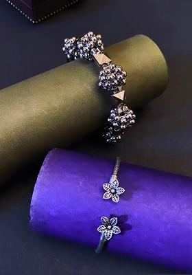 Set Of 2 Silver Plated And Floral Shaped Adjustable Bangles