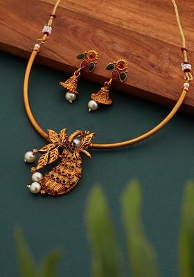 Gold Plated Stones Studded And Beaded Peacock Shaped Jewellery Set