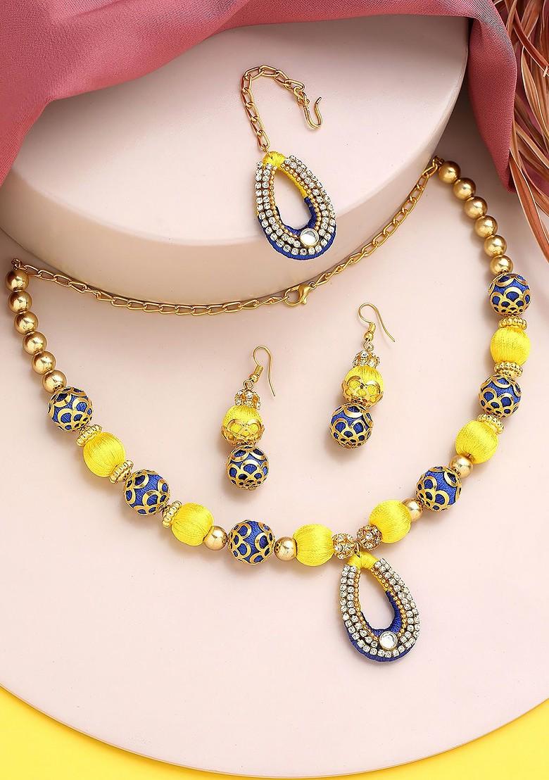 Gold Plated Stone Studded And Pearl Beaded Jewellery Set