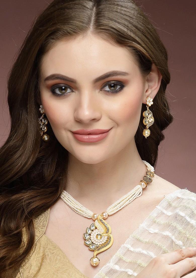 Gold Plated Kundan Stud And Pearl Bead Jewellery Set