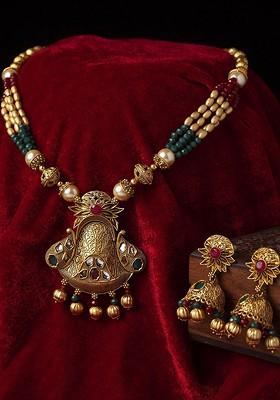 Gold Plated Stones Studded And Beaded Necklace And Earrings