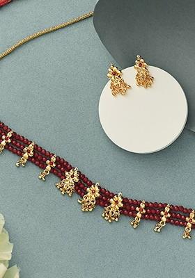 Gold Plated Stone Studded And Beaded Floral Shaped Choker Jewellery Set