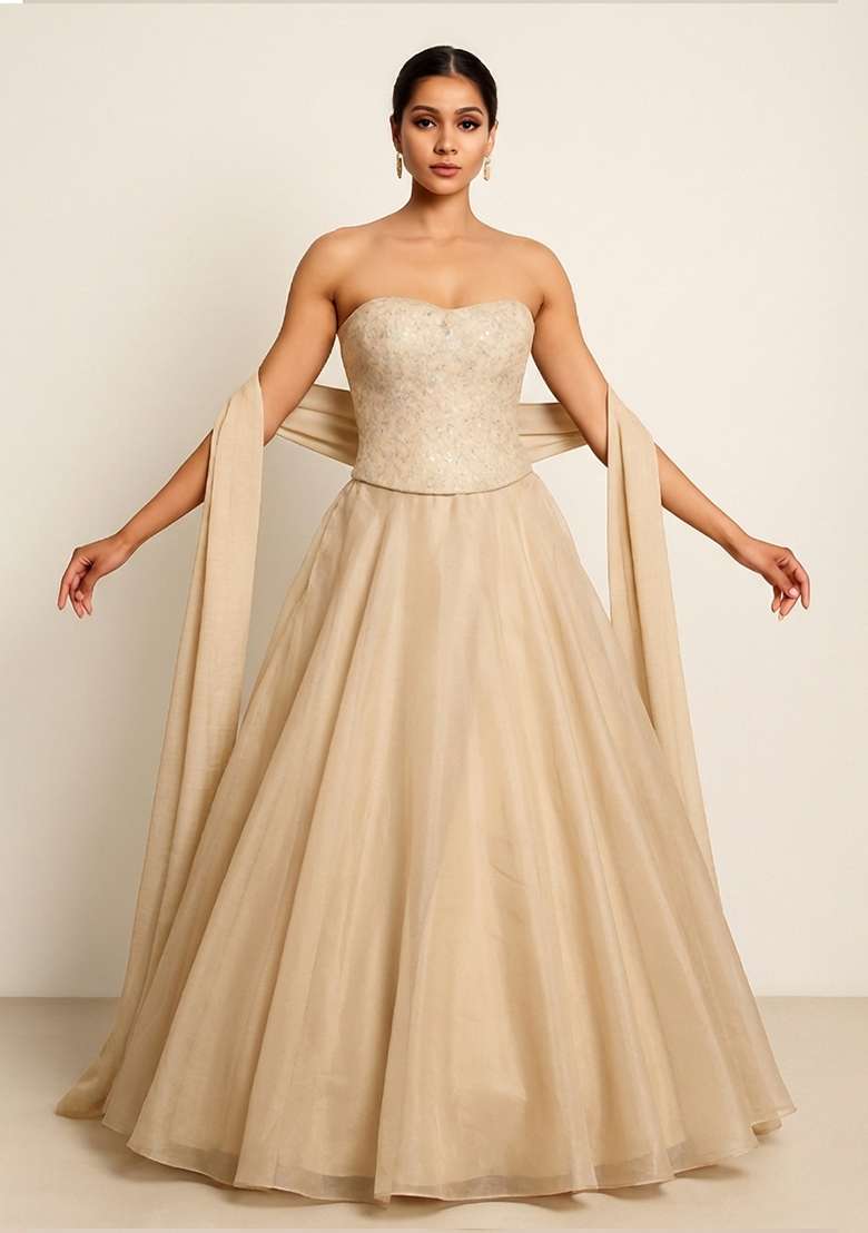 Rose Gold Embroidered Net Corset Blouse Lehenga Set for Diwali and Festive Wear - Indya