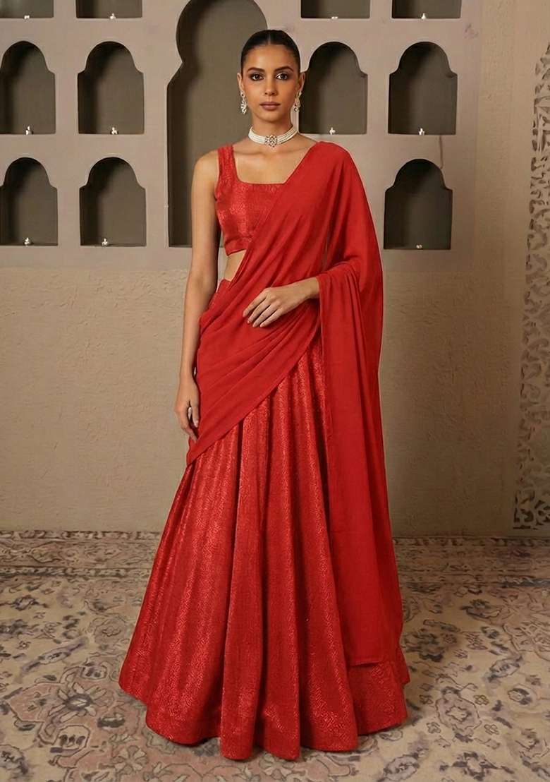 Tomato Red Self textured Lycra Lehenga Set for Diwali | Wedding & Festive Wear - Indya