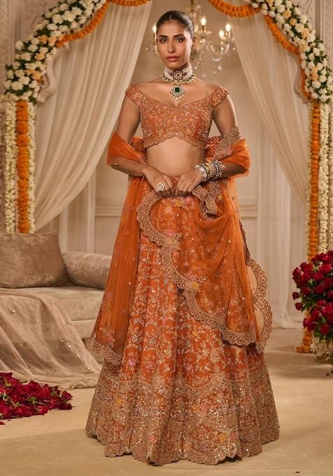 Rich Orange Embroidered Bridal Lehenga Set — view on Indya