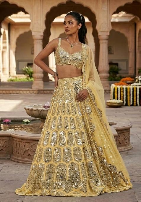 Yellow mirror work Bridal Lehenga Set — view on Indya