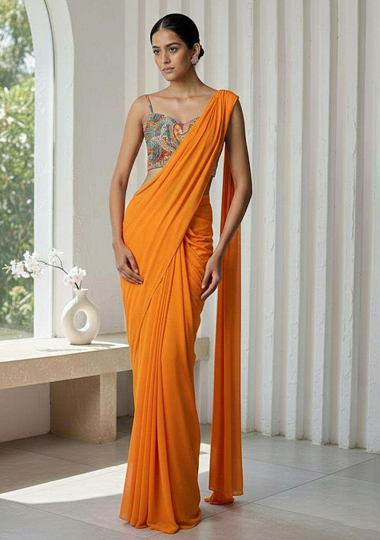 Orange Crepe Pre Draped Saree Set With Floral Printed Blouse - Indya