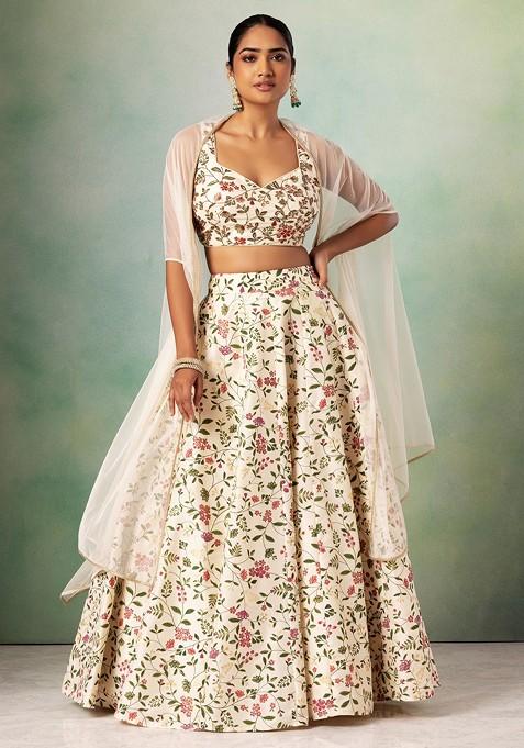 Ivory Floral Print lehenga Set With Hand Embroidered Blouse And Mesh Cape