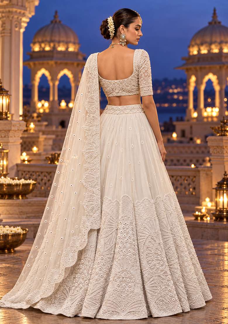 White Cutdana Embellished Georgette Lehenga Set With Net Dupatta - Indya
