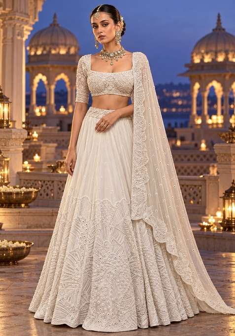 White Cutdana Embellished Georgette Lehenga Set With Net Dupatta