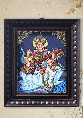 Fourarmed Goddess Saraswati On White Lotustanjore Painting With Teakwood Frame