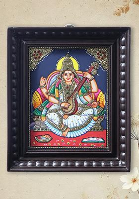 Sitting Devi Saraswati Playing Veena Tanjore Painting With Teakwood Frame