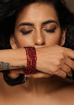 Red Gold Tone Beaded Bracelet