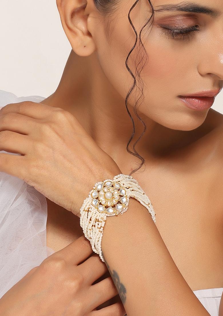 Gold Finish Kundan And Pearl Bracelet - Indya