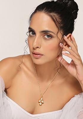 Gold Tone Leaf Clover Kundan Pendant Necklace