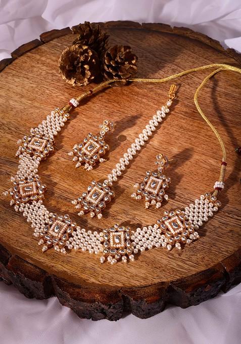 Gold Finish Kundan And White Pearl Necklace And Earrings Set With Maangtika