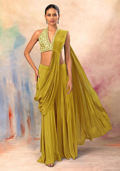 Mustard Flared Palazzo Set With Hand Embroidered Halter Blouse And Attached Drape