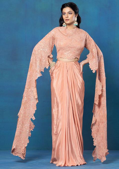 Peach Dhoti Skirt Set With Floral Sequin Embellished Cape Sleeve Blouse