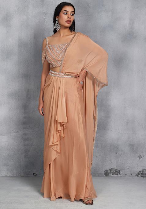 Peach Draped Skirt Set With Cutdana Embellished Blouse And Attached Dupatta