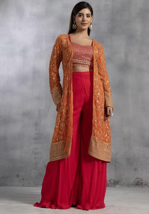 Pink Sharara Set With Sequin Embellished Blouse And Orange Jacket