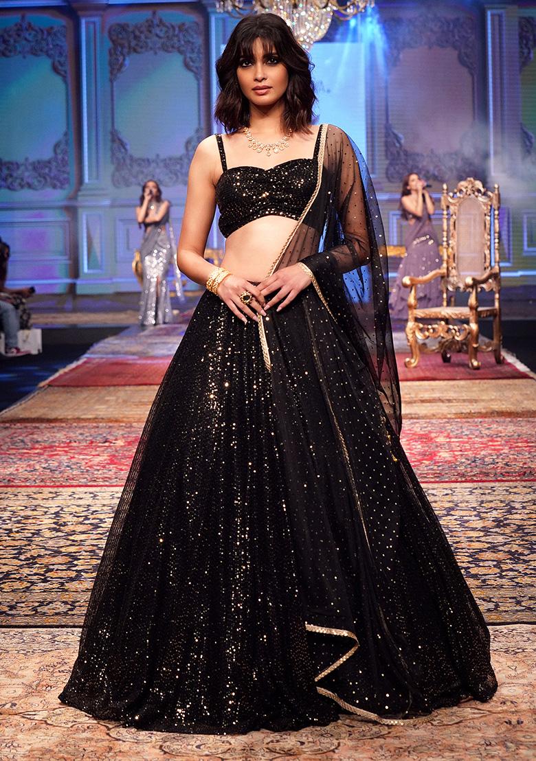 Aggregate more than 168 golden blouse with black lehenga