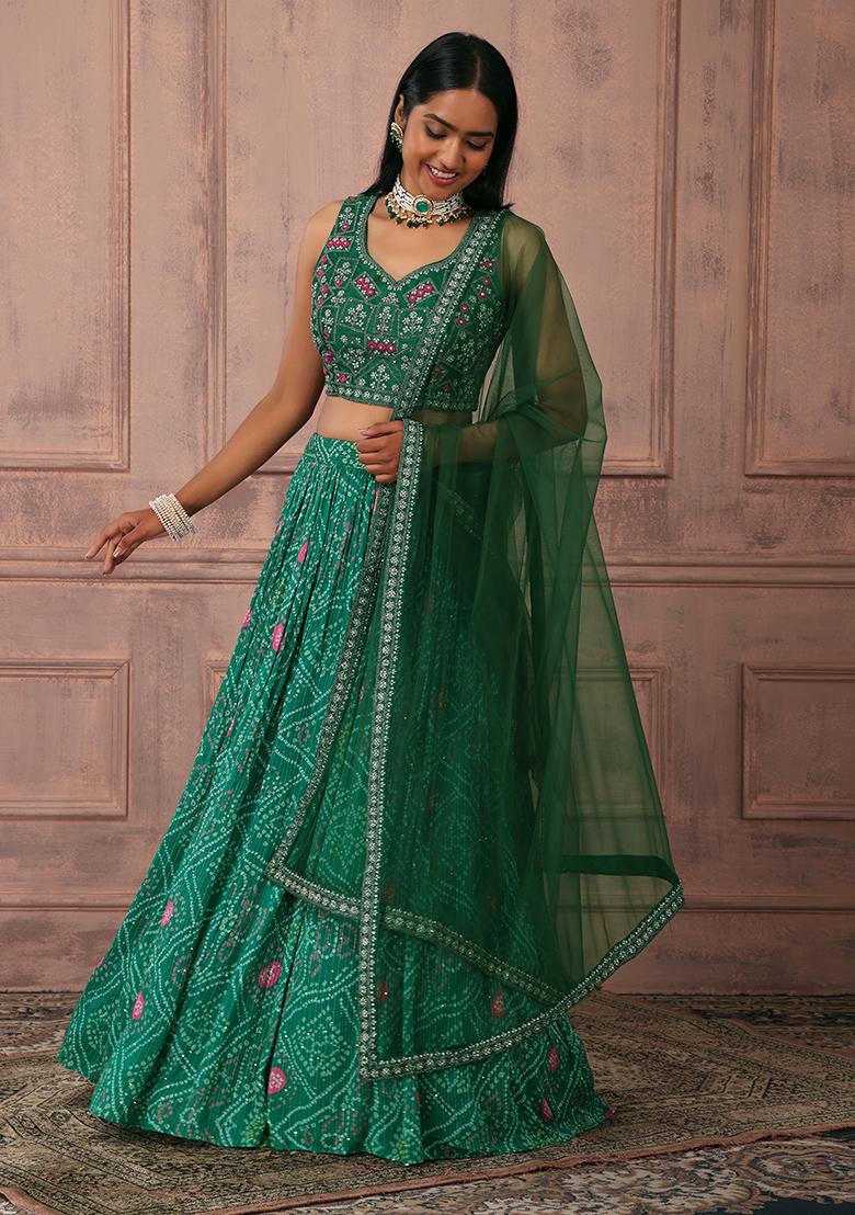 Bandhani outfits to dazzling wedding lehenga and luxe jewels, bride  Karishma Tanna's wedding lookbook oozes modish glamour with a traditional  touch