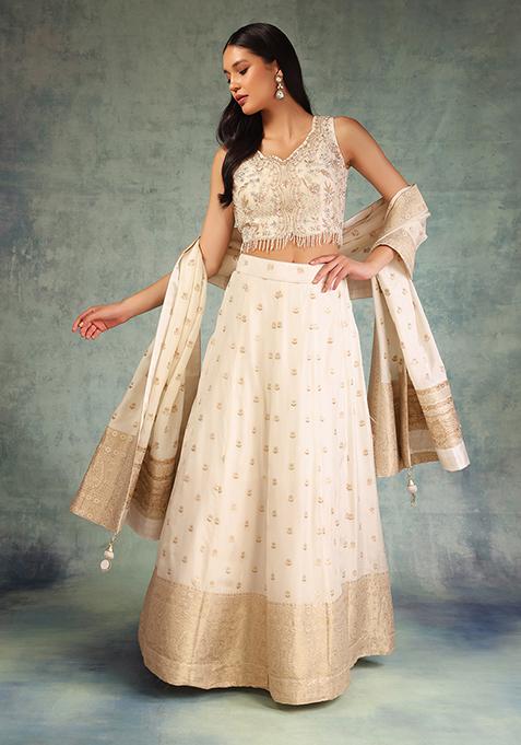 Off White Brocade Lehenga Set With Embroidered Blouse And Dupatta