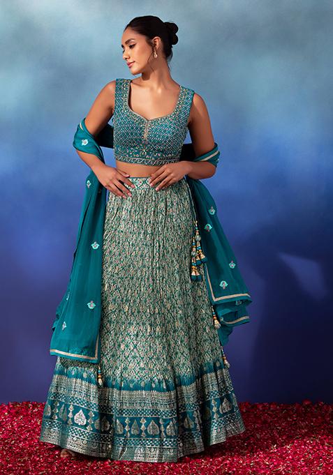 Peacock Green Abstract Print Brocade Lehenga Set With Embroidered Blouse And Dupatta