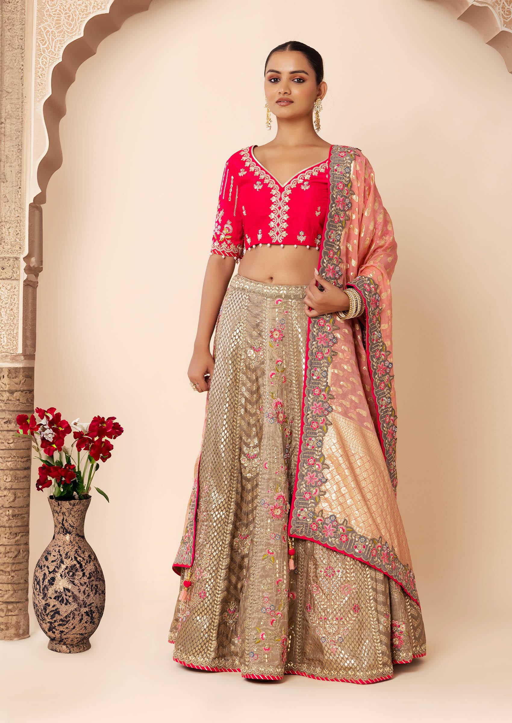 Light green brocade lehenga with a ready styled dupatta in yellow